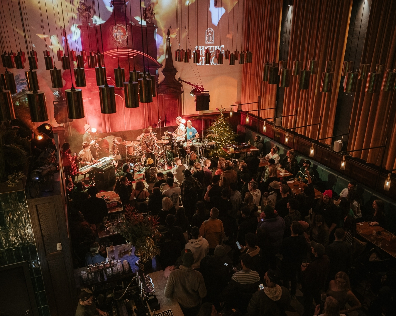 Amazing Grace London Bridge stage and dance floor lit for Christmas